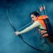 Mia Carragher, as Katniss, uses a bow and arrow in "The Hunger Games: On Stage."