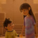Ellliot and Stevie holding hands in sandman's castle in In Your Dreams.