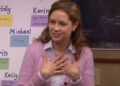 Pam Beesly stands in front of a resolution board in The Office (2011)
