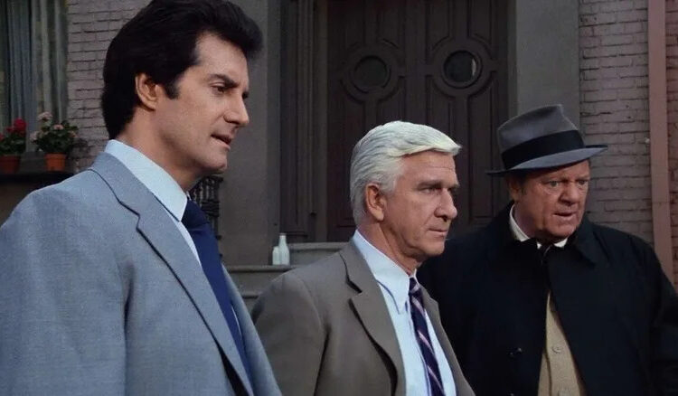 Norberg talking with Lietenant Drebin and Captain Hocken in Police Squad!