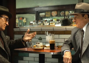 Robert De Niro sits in a diner playing both Frank Costello and Vito Genovese in The Alto Knights