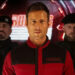 Ben Richards being flanked by guards in The Running Man