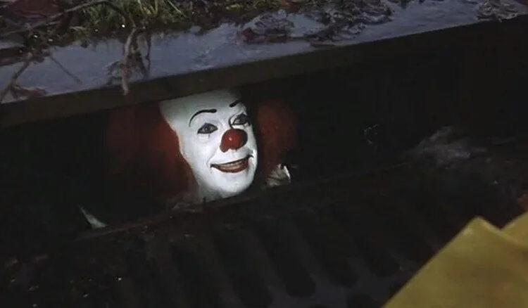 It, Pennywise luring Georgie into the sewer