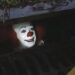 It, Pennywise luring Georgie into the sewer