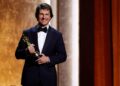 Tom Cruise touts the power of cinema as he accepts honorary Oscar