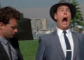 Dan Aykroyd as Sgt. Joe Friday yelps and crosses his eyes in Dragnet