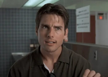 Tom Cruise has an intense conversation in a restroom as Jerry Maguire