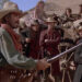 Quigley holding his rifle in Quigley Down Under
