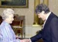 Queen Elizabeth II with Sir Tom Stoppard at Buckingham Palace in 2000 when he was awarded the Order of Merit.