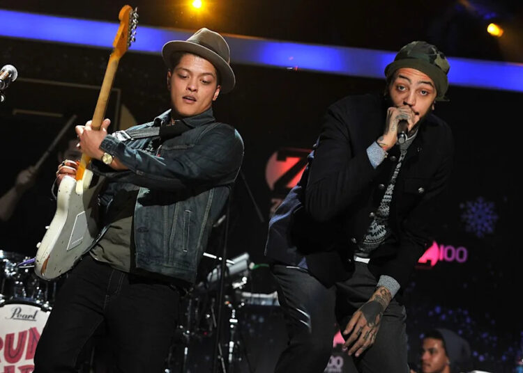 Theo Wargo/WireImage Bruno Mars and Travie McCoy in December 2010 in New York City