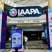 Entrance to IAAPA Expo with sponsor logos displayed on large pillars.