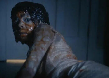Ronnie is covered in blood and pus after the birth scare in It: Welcome to Derry