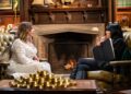 Charlotte Church and Claudia Winkleman sit opposite on arm chairs deep in conversation.