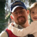 Channing Tatum as Jimmy carrying Farrah Mackenzie as Sadie in Logan Lucky