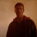 Glen Powell's Ben Richards wearing a hoodie in The Running Man