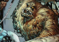 Clayface prepares to hit a tied up Batman in Batman The Dark Knight #23.3