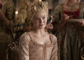 Catherine sitting amongst her ladies smirking in The Great