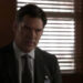 Thomas Gibson's Aaron Hotchner sits in an office in Criminal Minds