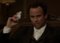 Boyd Crowder (Walton Goggins) holding cigarettes in Justified
