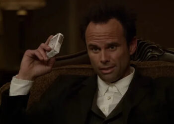 Boyd Crowder (Walton Goggins) holding cigarettes in Justified