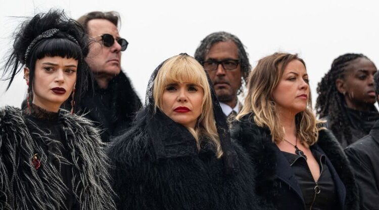 Ruth Codd, Paloma Faith and Charlott Church dressed in black and looking solemn in The Celebrity Traitors.
