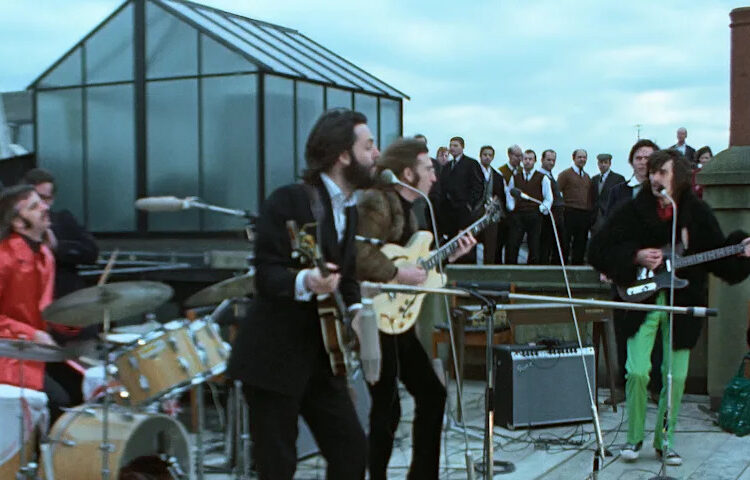 Ringo Starr, Paul McCartney, John Lennon, and George Harrison in THE BEATLES: GET BACK. Photo courtesy of Apple Corps Ltd.