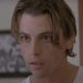 Skeet Ulrich as Billy Loomis darting his eyes at Sidney in Scream.
