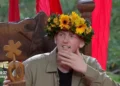 Angry Ginge sits down for his post-win interview, still emotional and smiling, as studio lights and the jungle backdrop frame the moment he reflects on becoming King of the Jungle 2025.