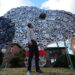 Baltimore cyclist finds joy in collecting lost hubcaps and stringing them into art