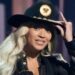 Beyonce, left, accepts the Innovator Award as presenter Stevie Wonder looks on during the iHeartRadio Music Awards, Monday, April 1, 2024, in Los Angeles. (AP Photo/Chris Pizzello)