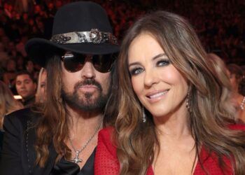 Billy Ray Cyrus matches Elizabeth Hurley in festive attire - Celebrity News - Entertainment