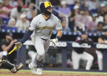 Milwaukee Brewers' Isaac Collins (6) runs after hitting a RBI single to score Jackson Chourio during the fourth inning of a baseball game against the Miami Marlins, Saturday, July 5, 2025, in Miami.