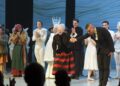 Queen Margrethe of Denmark takes a bow with the cast of this year's Christmas ballet, the Snow Queen, at the Tivoli's Concert Hall on November 27, 2025 (Keld Navntoft/Tivoli Gardens)