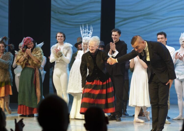 Queen Margrethe of Denmark takes a bow with the cast of this year's Christmas ballet, the Snow Queen, at the Tivoli's Concert Hall on November 27, 2025 (Keld Navntoft/Tivoli Gardens)