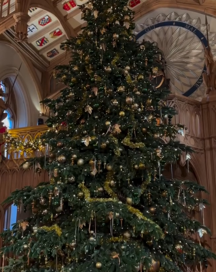 Gold and green baubles on a Christmas tree in St. George's Hall