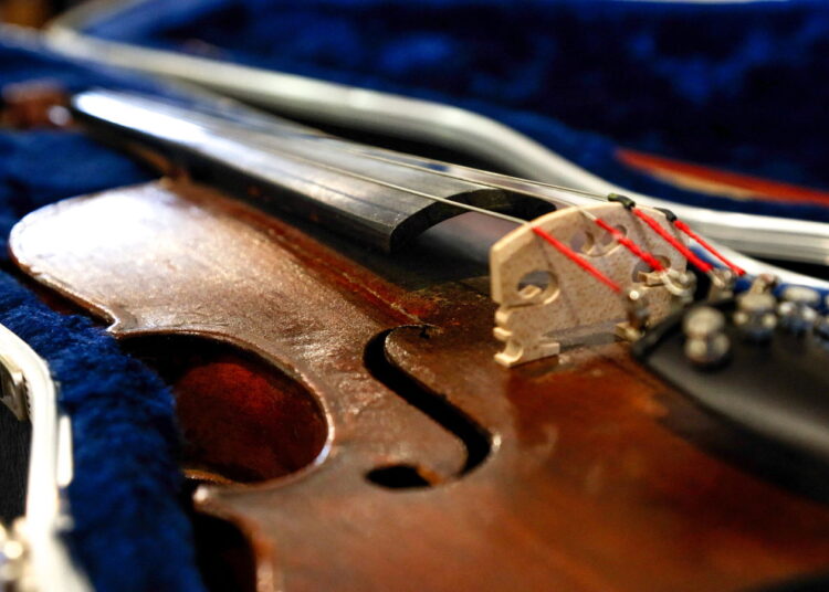 Historic fiddle owned by Joseph Robidoux restored in new music exhibit at Robidoux Row Museum