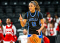Holman surpasses 1,000 points, leads Royals to Mudsock win