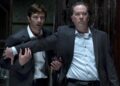 Michiel Huisman and Timothy Hutton, both wearing suits, in "The Haunting of Hill House."