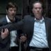 Michiel Huisman and Timothy Hutton, both wearing suits, in "The Haunting of Hill House."