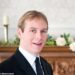 When one of King Charles's former butlers arrived for work with a bright orange tan, Grant Harrold (pictured) was immediately pulled up by His Majesty