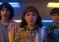 Mike, eleven, and will at the roller rink in stranger things season 4 volume 1.