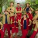 ITV Twelve people can be seen wearing various outfits of red and khaki green, with some wearing large khaki hats. They are posed in front of a jungle backdrop as part of the announcement for the new cast of I'm a Celebrity...Get Me Out of Here!