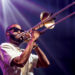 Trombone Shorty playing the trombone