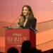 Honoree Jennifer Lopez accepts the Equity in Entertainment award onstage during The Hollywood Reporter Women In Entertainment Presented By Lifetime at The Beverly Hills Hotel on December 03, 2025 in Beverly Hills, California.