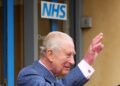 King Charles waves