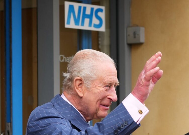 King Charles waves