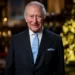 PA Media King Charles III in front of Christmas tree delivering speech in Westminster Abbey