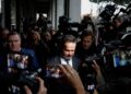 Defense attorney Alan Jackson arrives outside Los Angeles Superior Court on Wednesday.