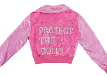 A pink jacket. On the back of it is written: Protect the Dolls.