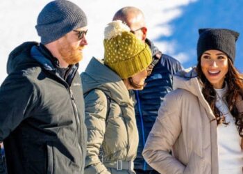 Meghan Markle and Prince Harry are 'clinging' to their royal titles with their Archewell rebrand, claims an expert. MEGA